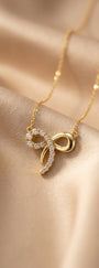 Glowing Bow Necklace