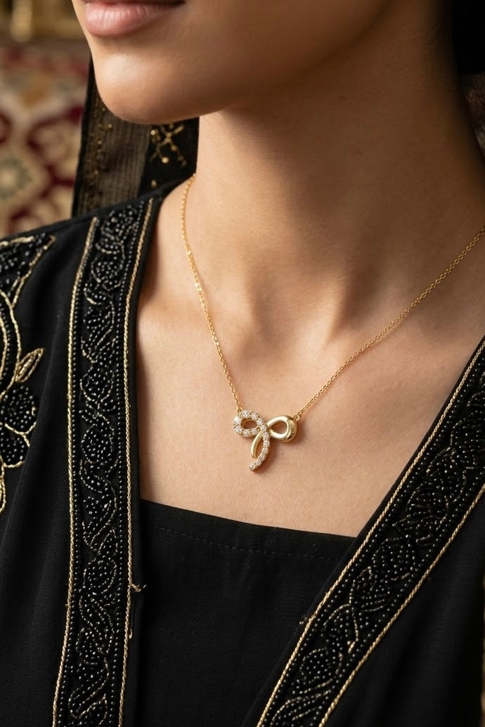 Glowing Bow Necklace