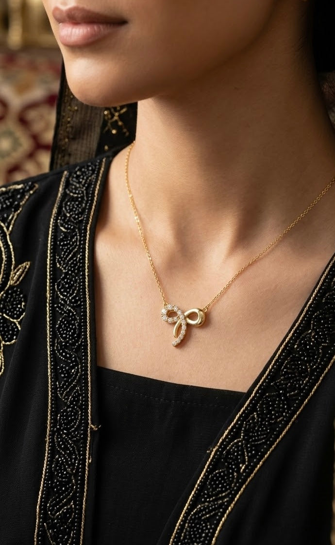 Glowing Bow Necklace