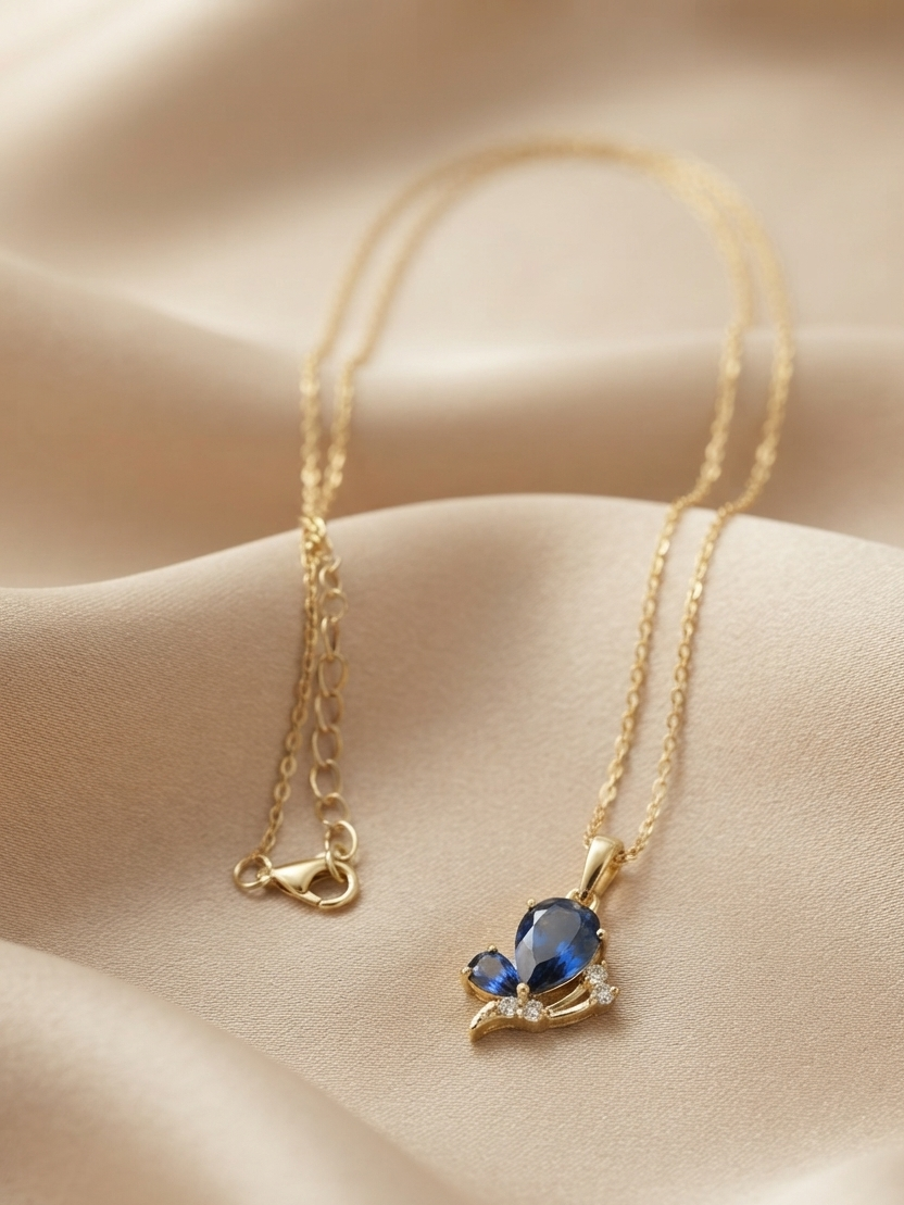Glowing Butterfly necklace by Ritzy