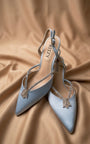 Tulip heels in blue with signature tulip detail by Ritzy
