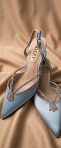Tulip heels in blue with signature tulip detail by Ritzy