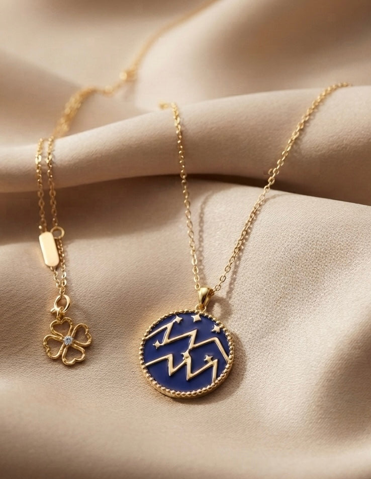 Aquarius zodiac necklace by Ritzy