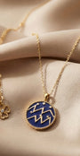 Aquarius zodiac necklace by Ritzy